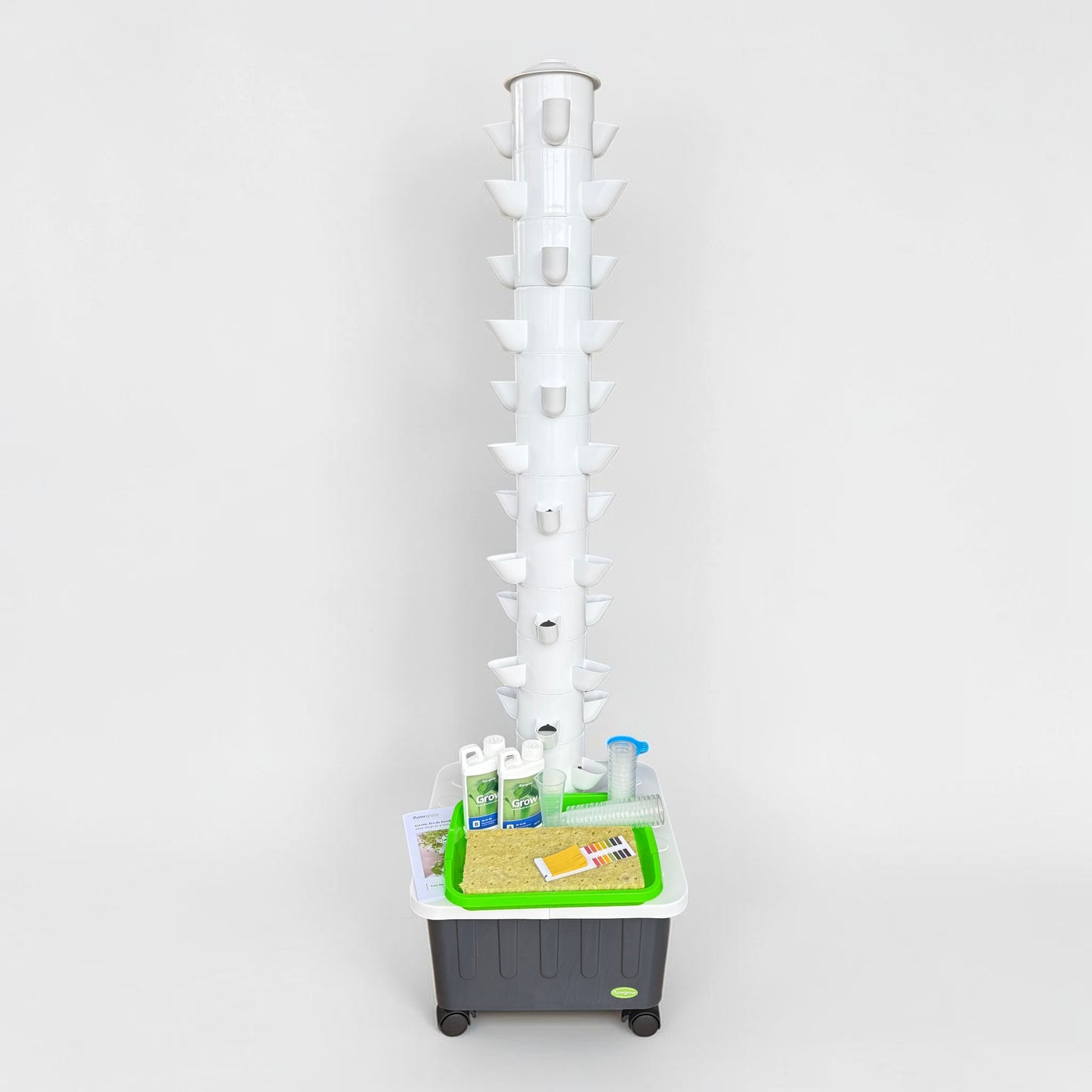 FlowGrow 12 Layer Hydroponic Tower with Starter Kit including Grow nutrients, rockwool cubes, net pots, pH test strips and seed starting essentials.