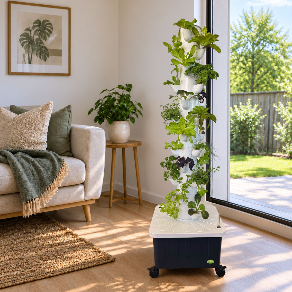 FlowGrow 12 Layer hydroponic tower growing fresh herbs and leafy greens beside a sunny window in a New Zealand home
