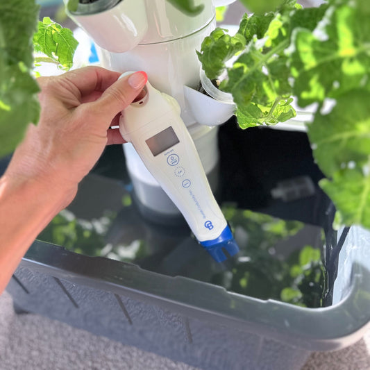 Bluelab EC nutrient reader pen for checking hydroponic water strength in a FlowGrow tower