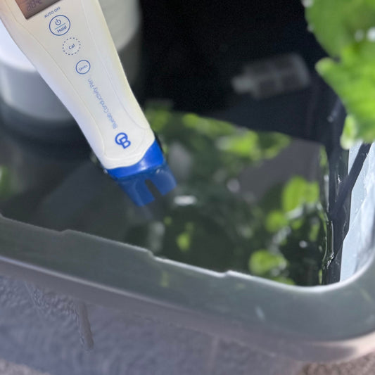Bluelab Conductivity Pen measuring nutrient water in a FlowGrow tower