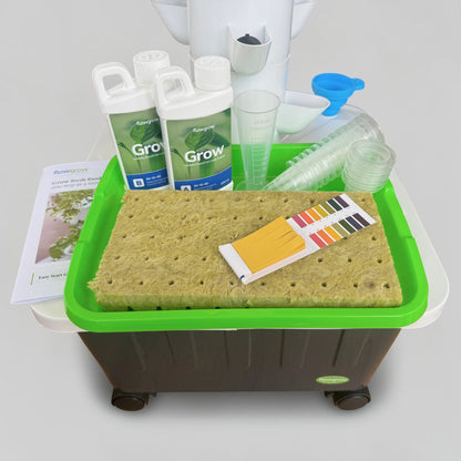 FlowGrow Hydroponic Tower with Starter Kit including Grow nutrients, rockwool cubes, net pots, pH test strips and seed starting essentials.
