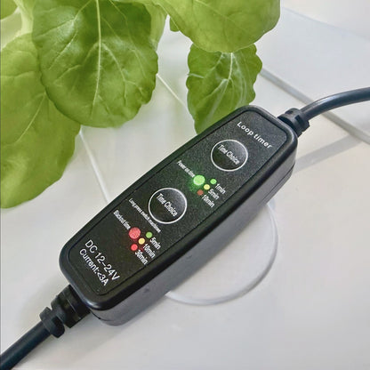FlowGrow timer connected to a hydroponic tower pump system