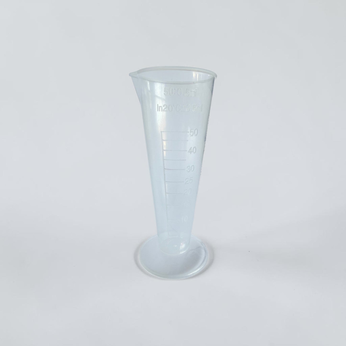 Clear 50 mL measuring cup for mixing FlowGrow hydroponic nutrients
