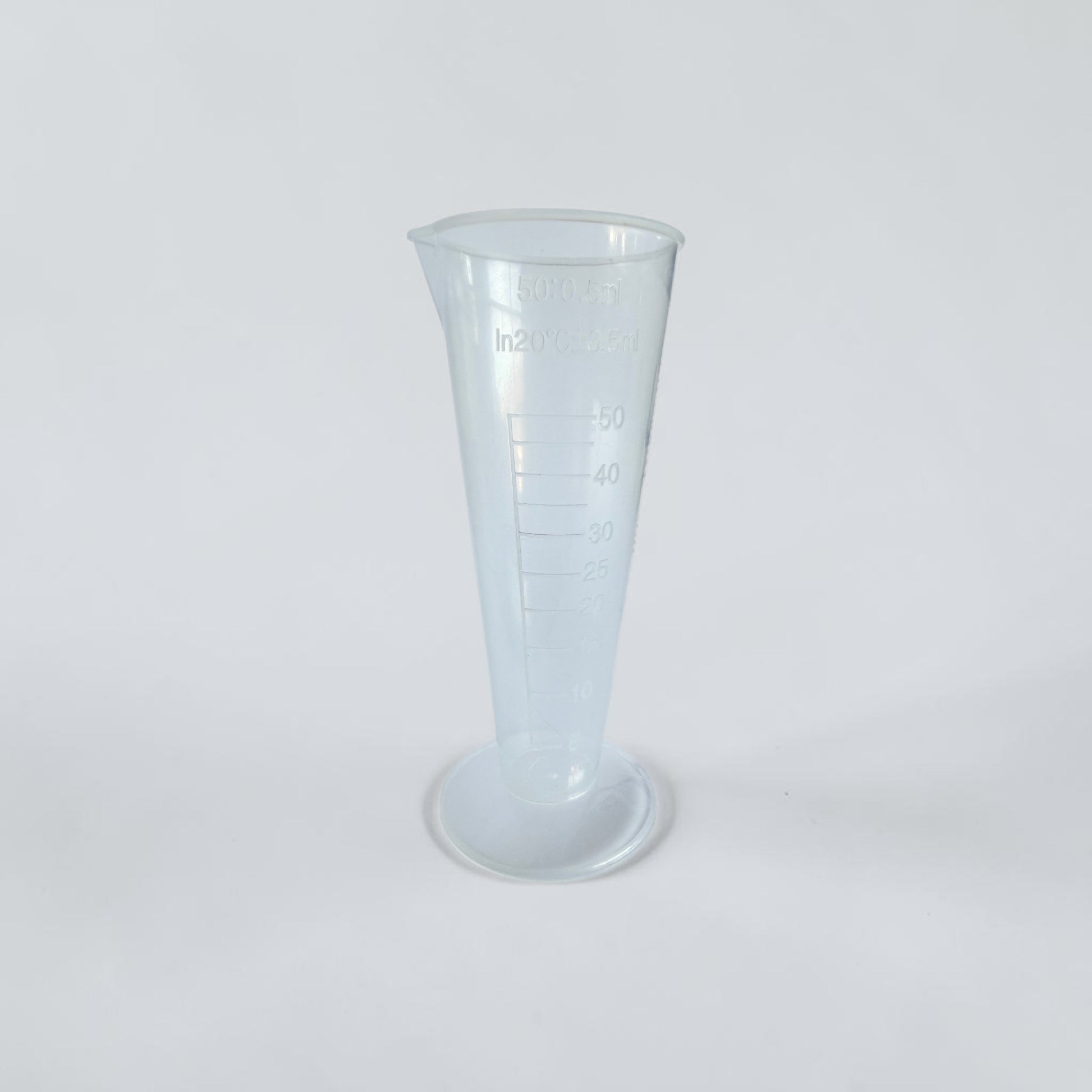 Clear 50 mL measuring cup for mixing FlowGrow hydroponic nutrients